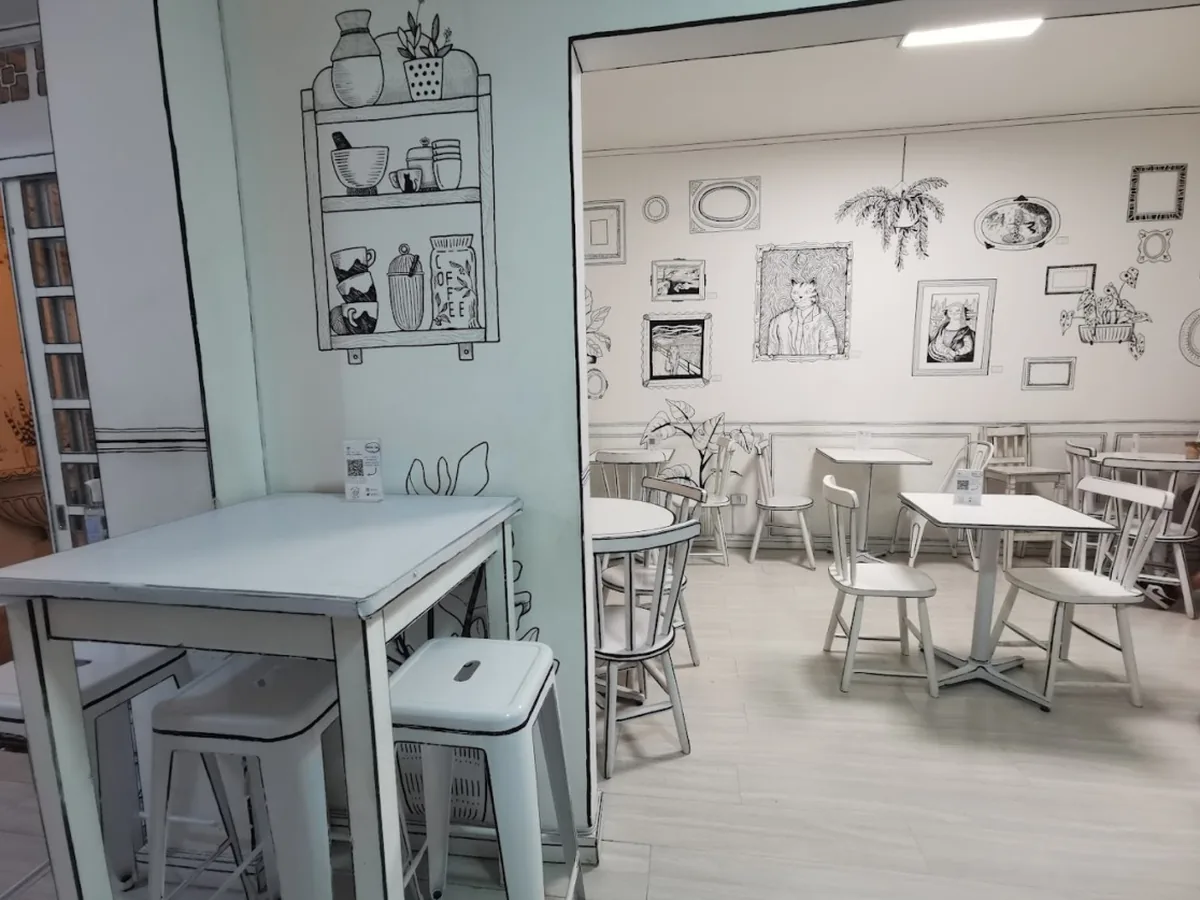 Salão com grafismo ilustrado, projeto da Híbrida Arquitetura